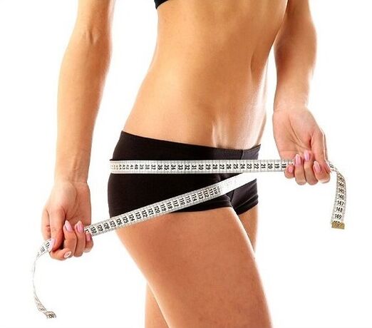 meting van heupen na inspanning om gewicht te verliezen
